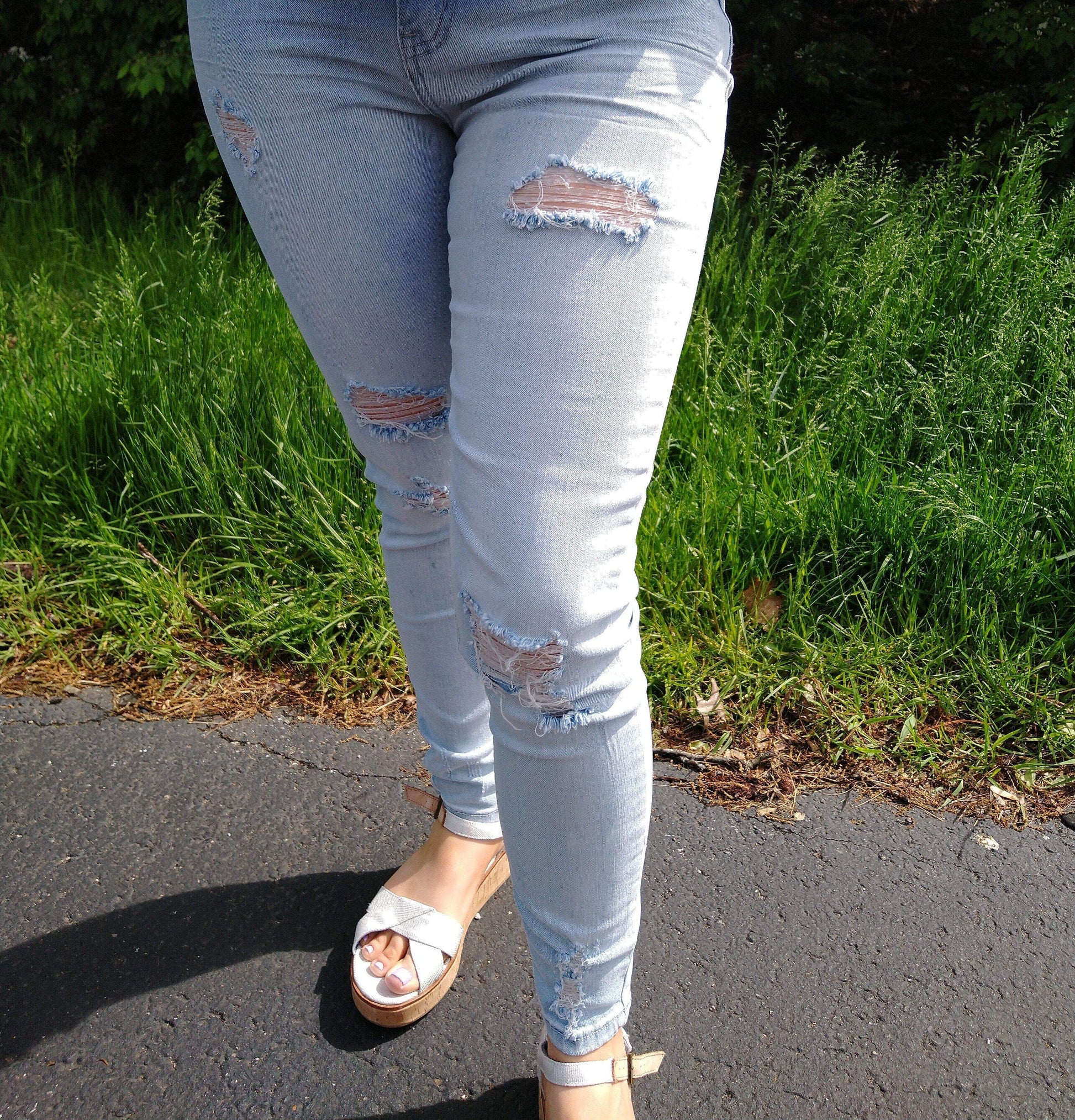 Light Wash Distressed High Rise Skinny Jeans Emysclosetllc